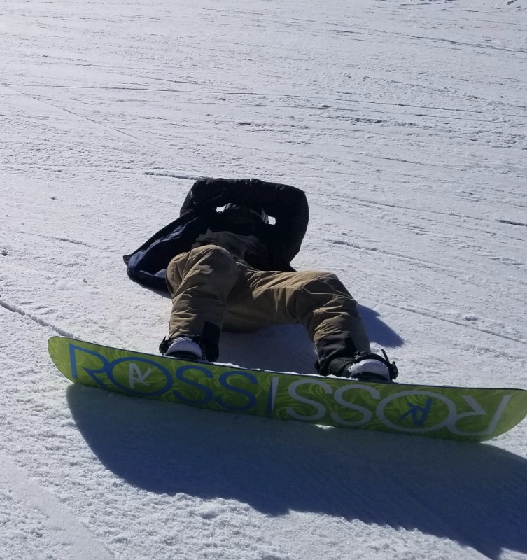 Casey Laying down after snowboarding